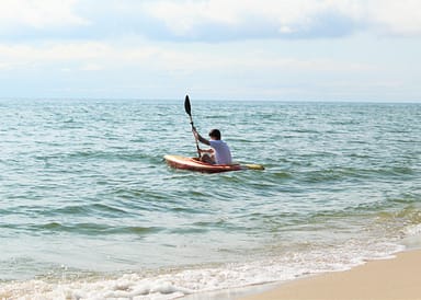 There are plenty of ways to enjoy the beach and water at the campground, including kayaking. 