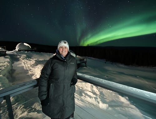 Standing in front of the Northern Lights